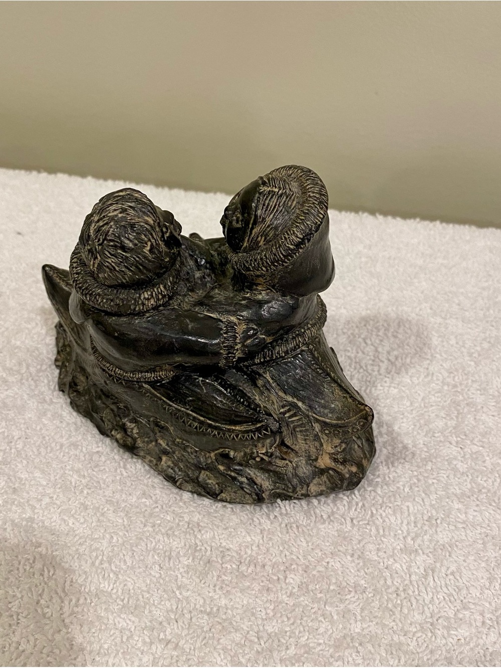 Hand-Carved Black Stone Inuit Kayak Sculpture